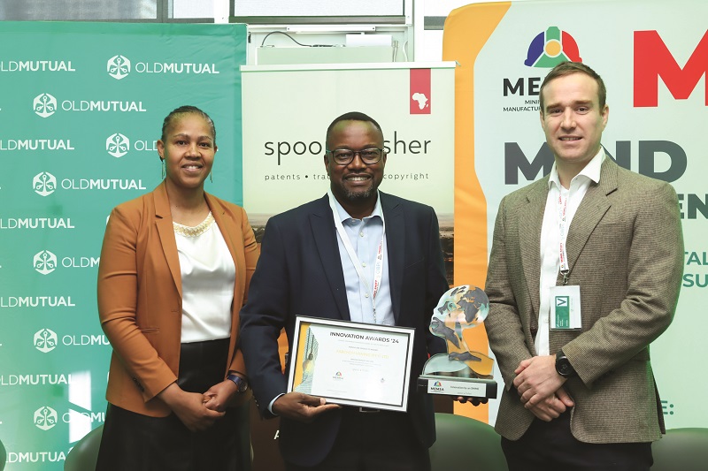 Christina Zondi, MEMSA board member with Freddy Mugeri of FabchemMining winners of the Innovation by an SME, and runners up for Digital Solutions for Mining, with Louw Steyn of Spoor and Fisher.