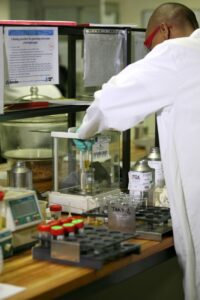 A WearCheck laboratory technician processes used oil samples to test for trace elements of contamination – information which provides important clues about a machine’s condition.